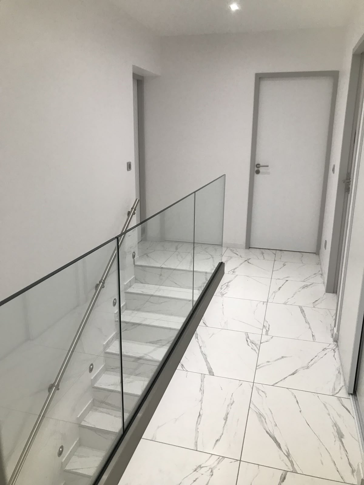 Cost-Effective Glass Railing Solution with U-Channel Framing - Anewson