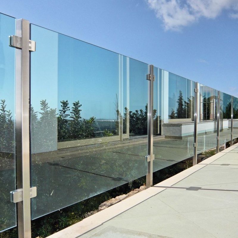 Frameless Glass Railing with Metal Posts: A Sleek Safety Solution - Anewson